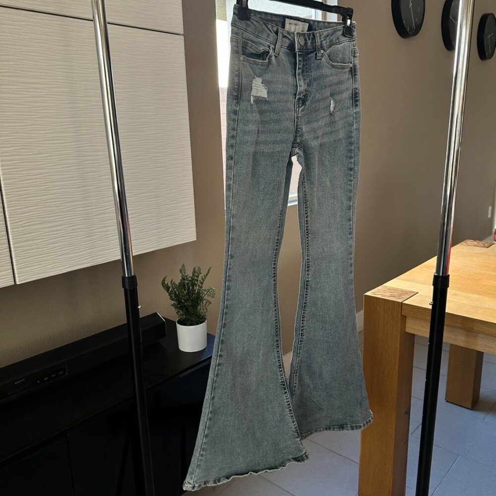 Light-wash flare jean with slight distressing